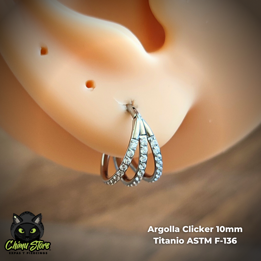 Argolla Clicker Titanio ASTM F-136 - Triple Anillo Zirconias Laterales (1,2mm) (16G)